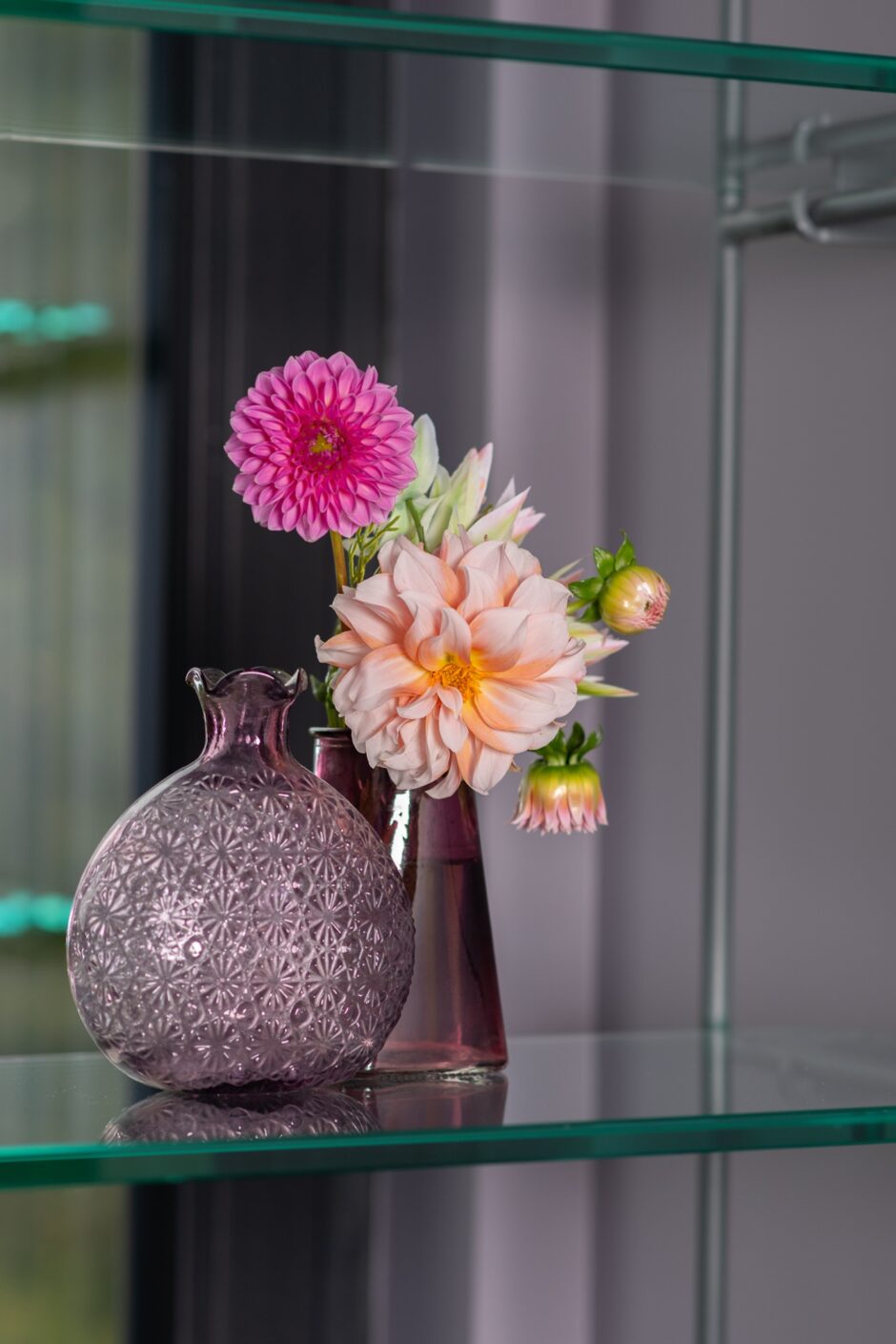 Purple Vases With Pink And Orange Flowers